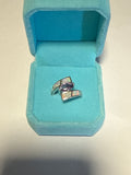 Facet amethyst with white opal inlay size 6.5
