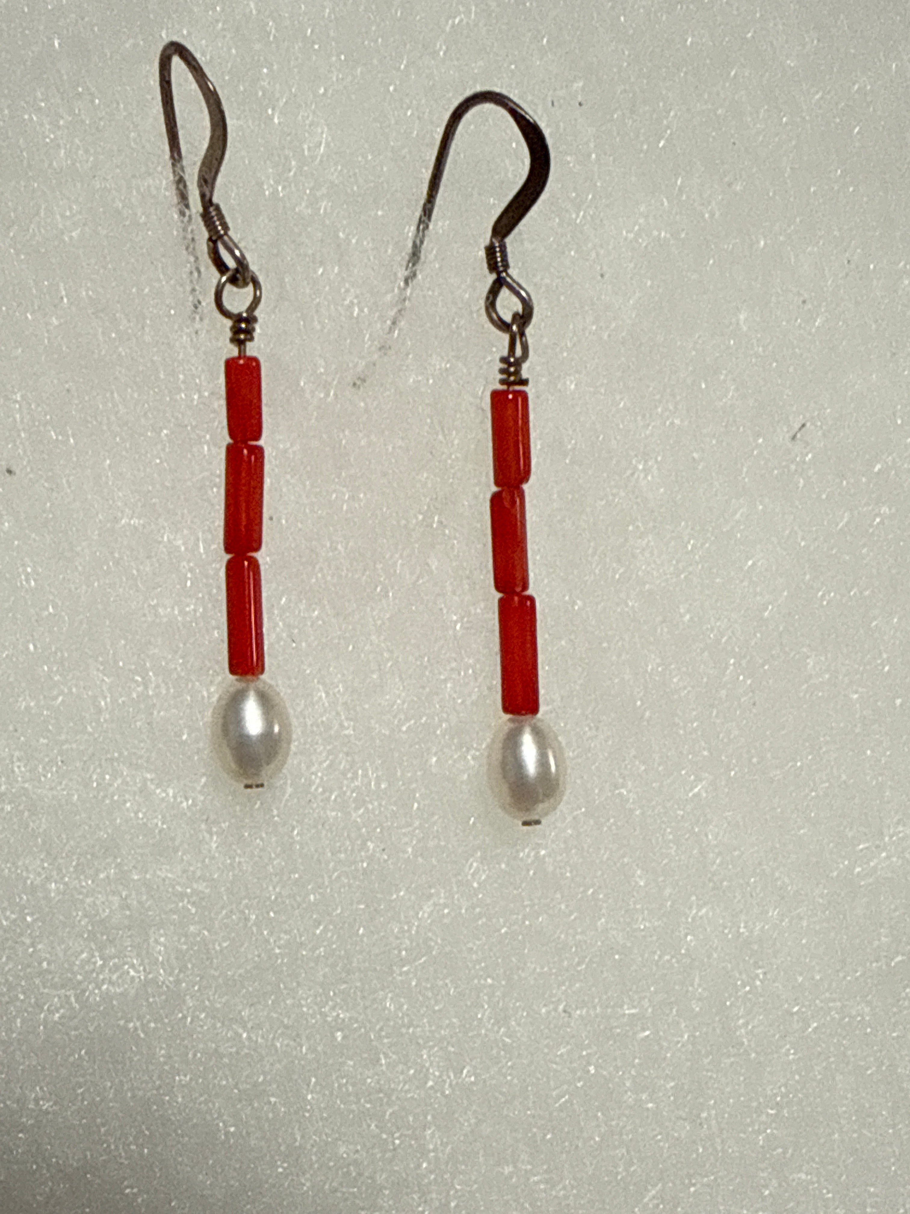 Dangle earrings with red coral and freshwater pearls