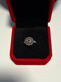 Adjustable toe ring with garnet