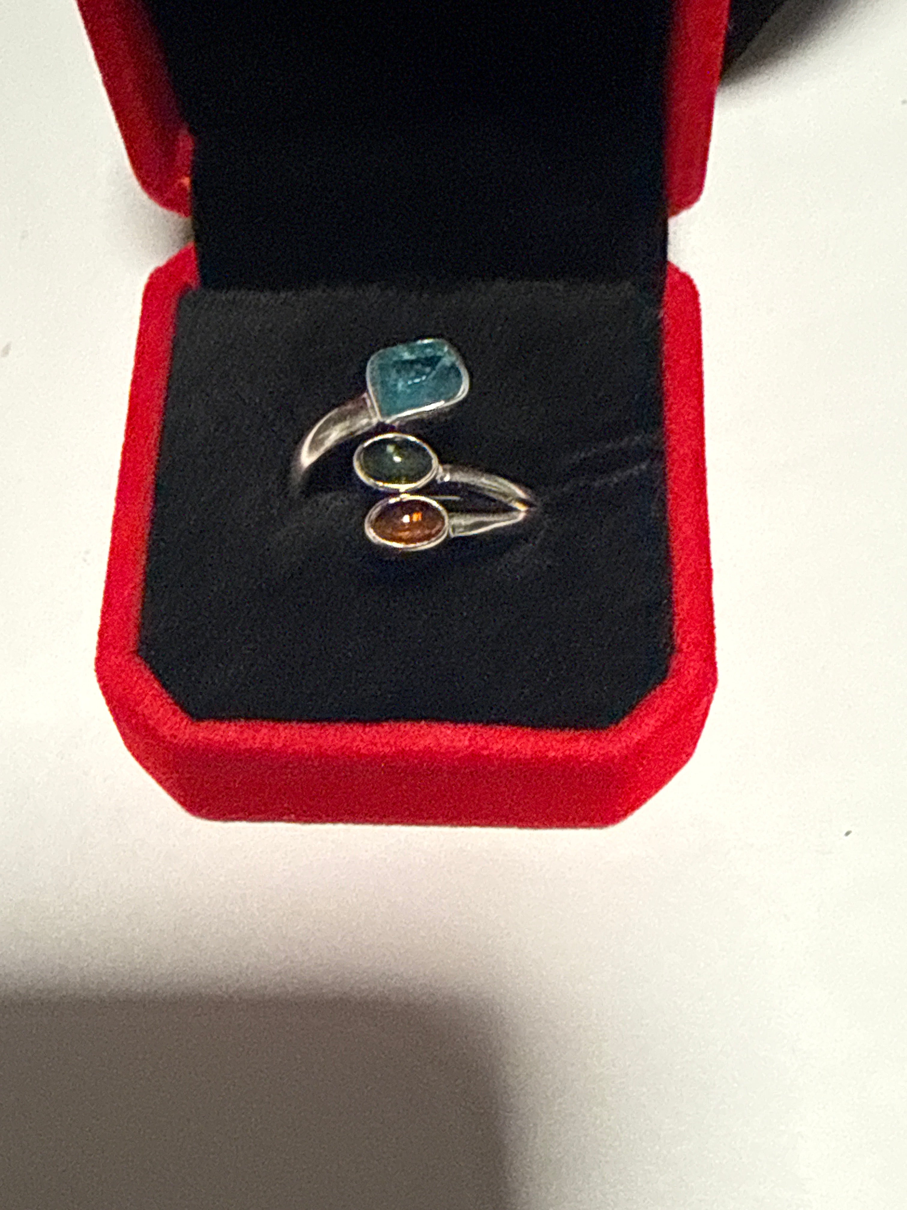 Adjustable fan ring Chrome diopside, citrine, and green kyanite.