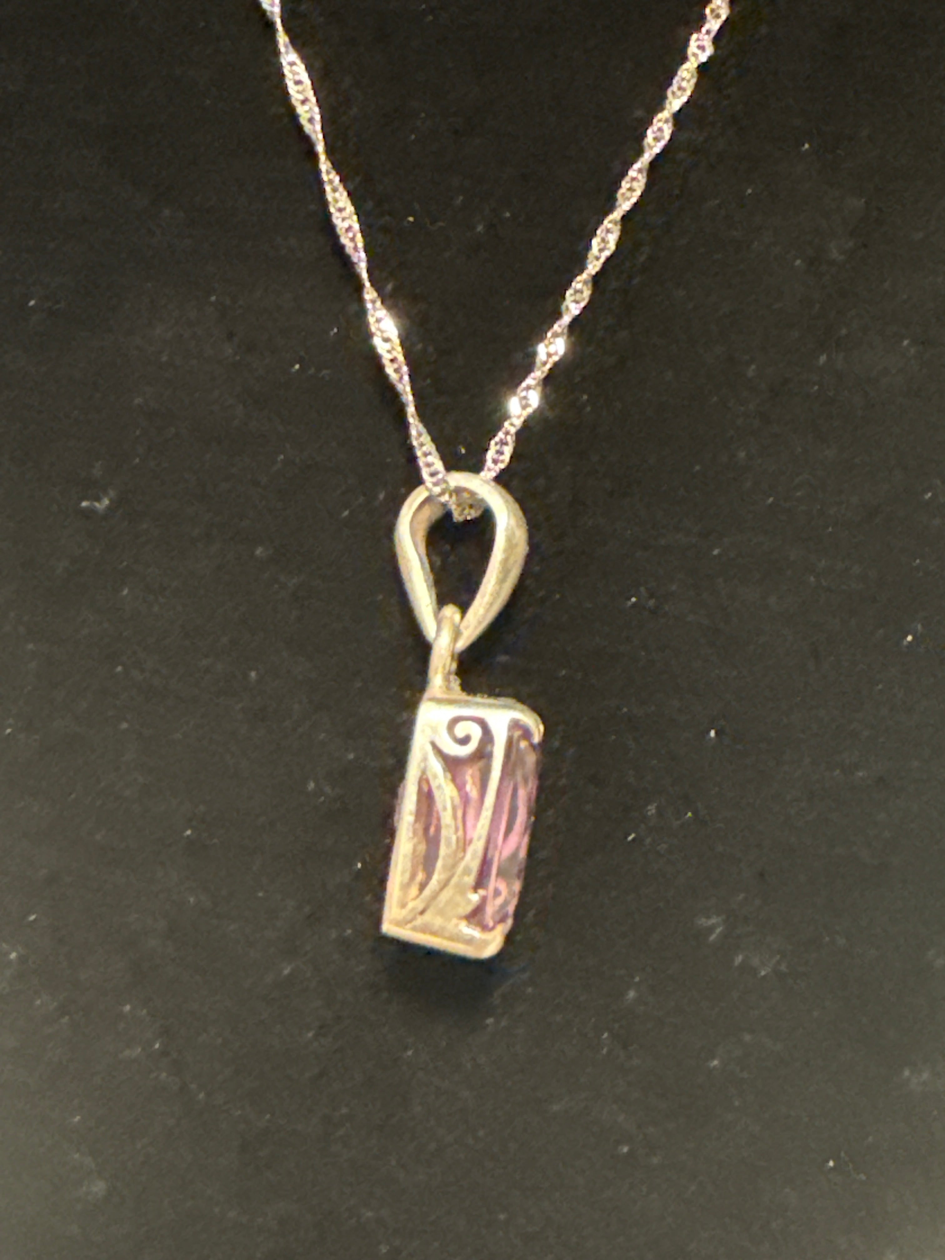 Brazilian facet amethyst, designer pendant with wave chain.