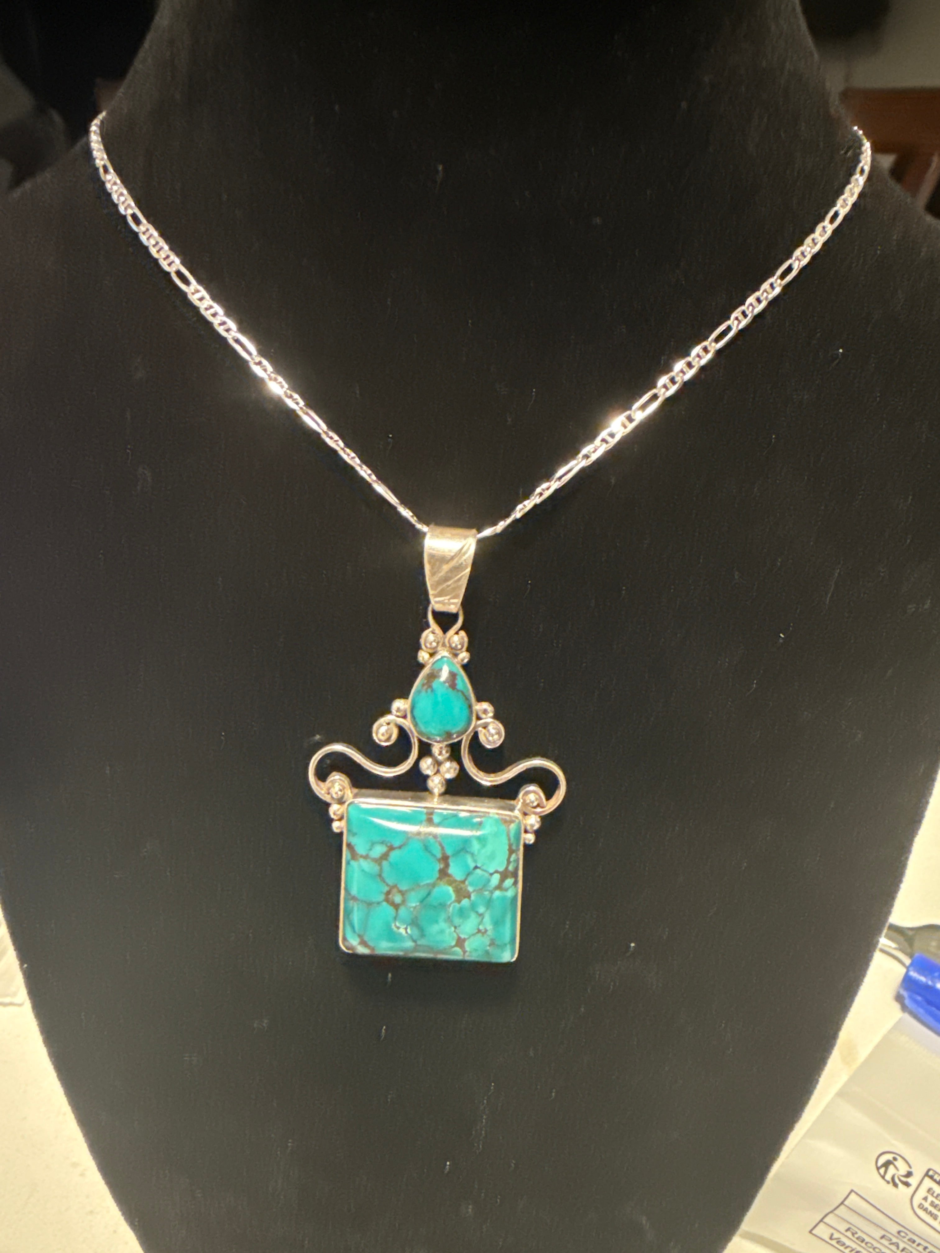 Two stone Nevada spiderweb, turquoise designer pendant with Italian chain.