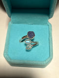 Adjustable fan ring 6/8 Tanzanite, rainbow moonstone and Pakmier diamond.
