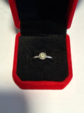 Adjustable toe ring with facet peridot stone.