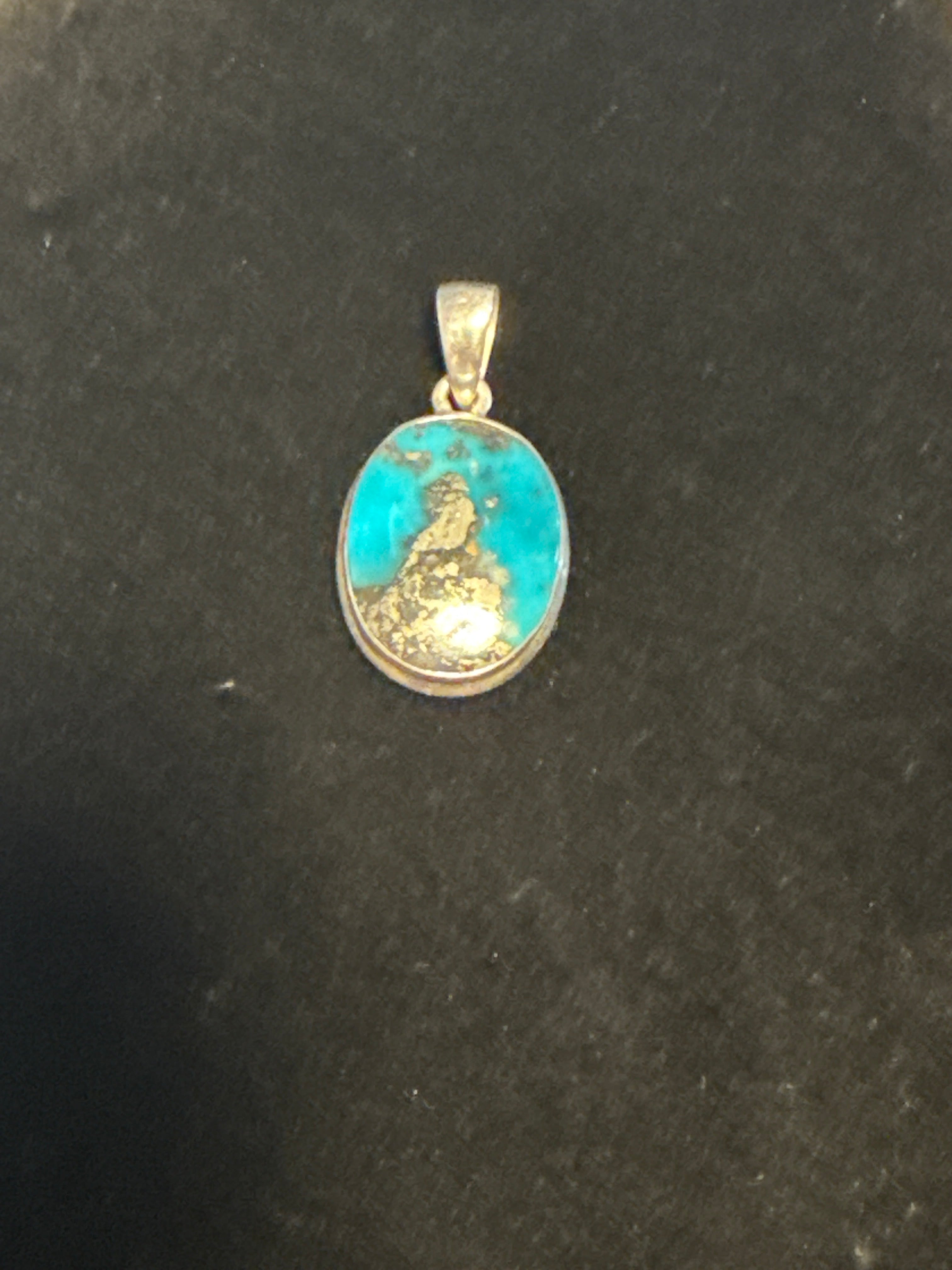 Shattuckkite pendant, cabochon set in solid sterling silver.